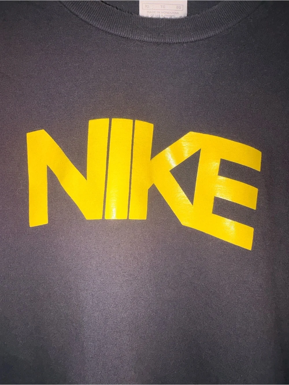 Nike Black Long-Sleeve Tee with Yellow Logo and Sleeve Text